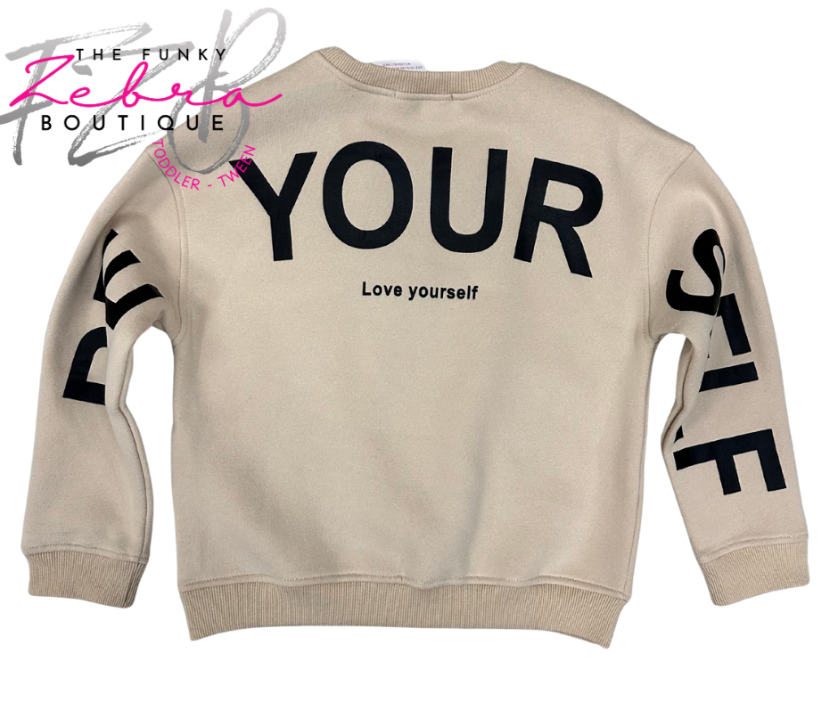 Beige sweatshirt with 'Love yourself' text on a white background, branded as The Funky Zebra Boutique.