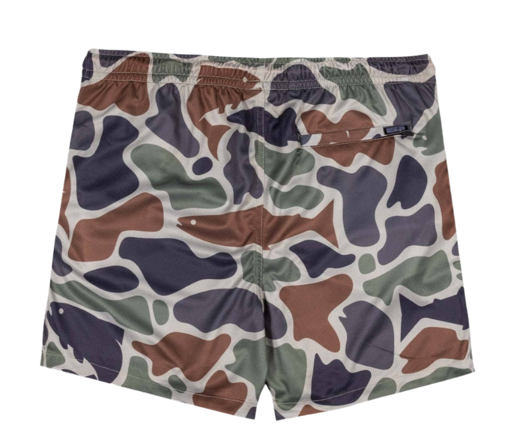 Camouflage-patterned shorts on a light gray background